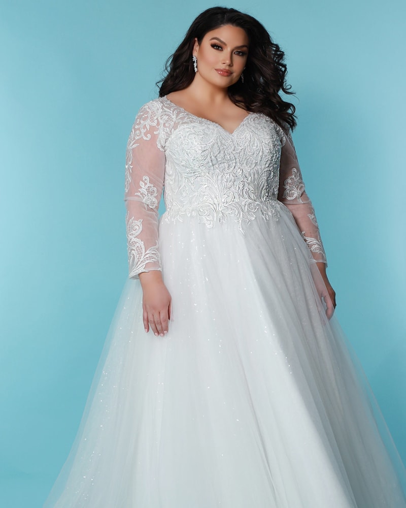 Front of a model wearing a size 20 Louisa Wedding Dress in Ivory by Sydney's Closet. | dia_product_style_image_id:286659